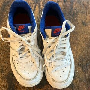Nike Force 1 youth sneakers.